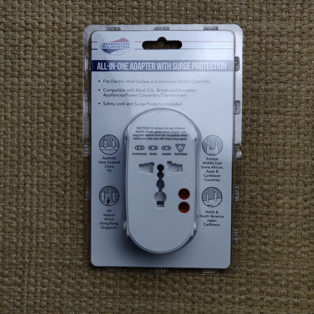 American tourister all in 1 plug with surge